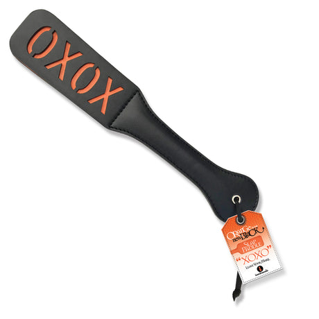 Orange Is The New Black XOXO Slap Paddle with playful XOXO impression for impact play.