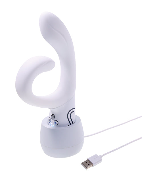 Illumination THE Rabbit Vibrator White charging in its dock with USB cable, showcasing innovative design and dual stimulation features.
