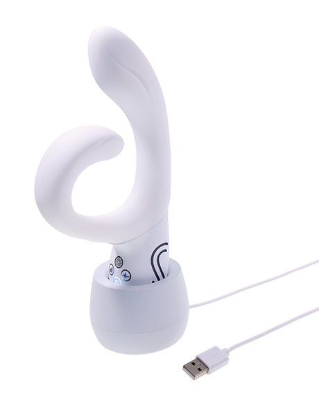 Illumination THE Rabbit Vibrator White charging in its dock with USB cable, showcasing innovative design and dual stimulation features.