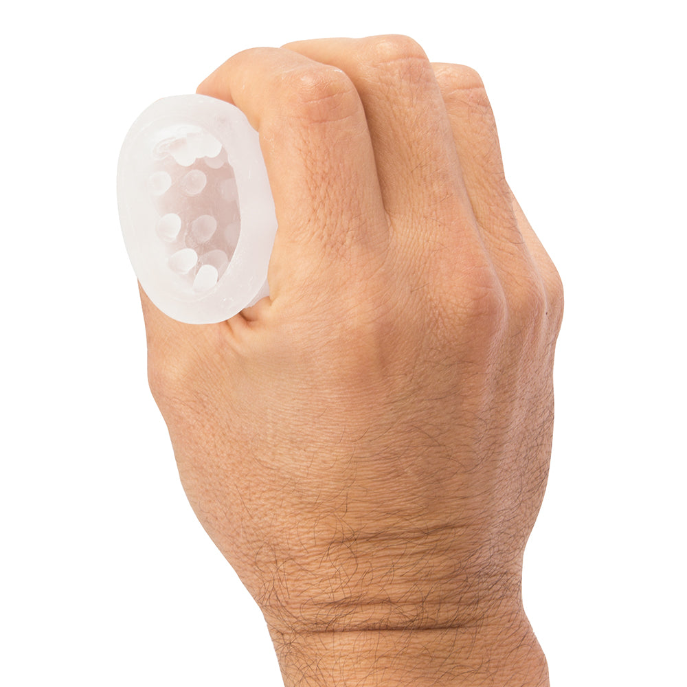 Screaming O Jackits Masturbation Sleeve Clear held in a hand showcasing its flexible design and nubby interior texture.