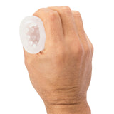 Screaming O Jackits Masturbation Sleeve Clear held in a hand showcasing its flexible design and nubby interior texture.