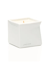 Jimmyjane Natural Massage Oil Candle 4.5 Oz Santal in a sleek white container with a wick.