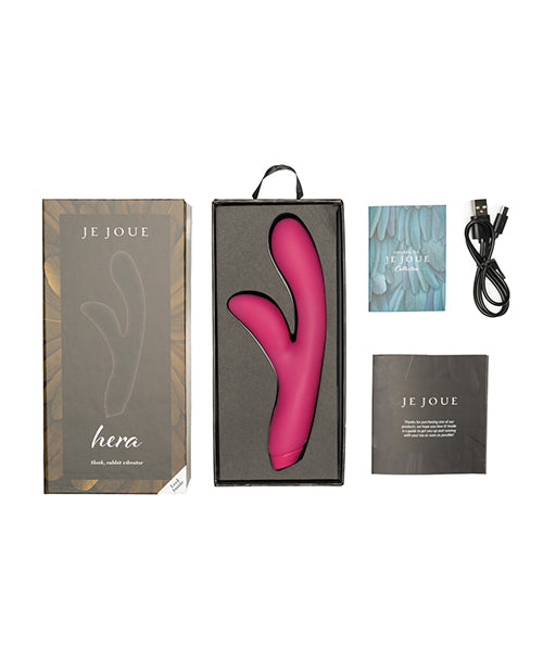 Je Joue Hera Rabbit Vibrator Fuchsia in packaging with accessories and user manual.