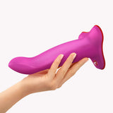 Fun Factory Limba Flex M Bendable Dildo Magenta held in hand, showcasing its flexible design for customizable positioning.