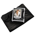 Liberator Fascinator Fur Throw Queen Black displayed with its packaging on a smooth surface.