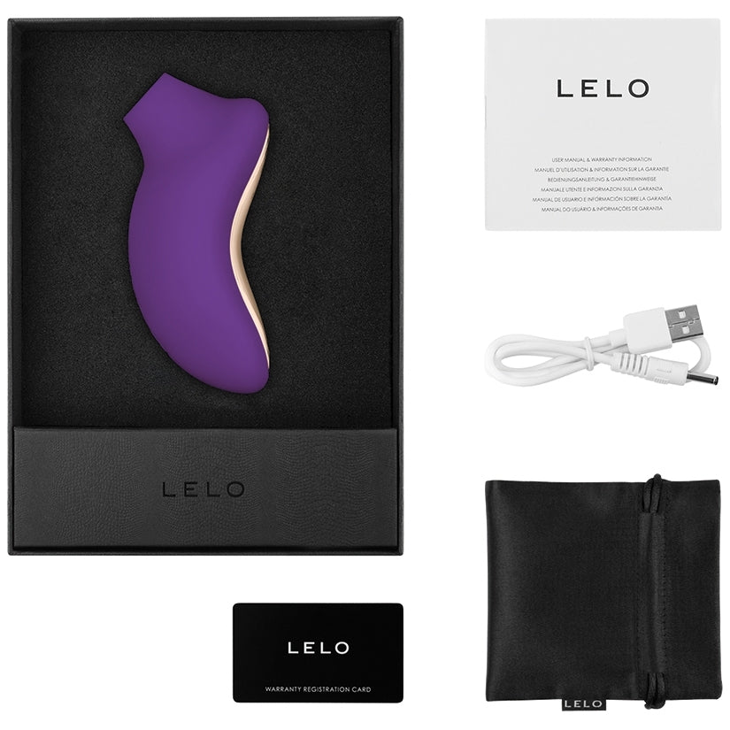 Lelo Sona 2 Sonic Clitoral Massager Purple in its packaging with accessories including USB, warranty card, and storage pouch.
