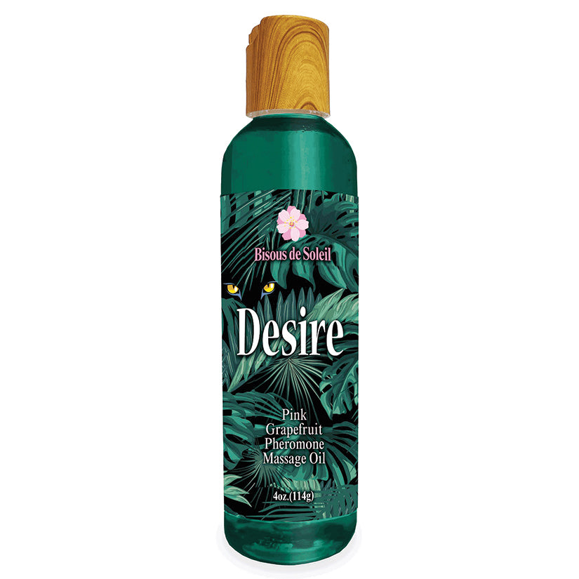 Desire Pheromone Massage Oil Pink Grapefruit 4 Oz bottle with floral and tropical design.