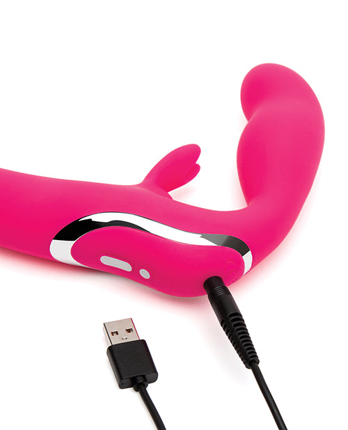 Happy Rabbit Rechargeable Pink Vibrating Strapless Strap On with USB charger for easy recharging.