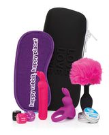 Happy Rabbit Couples Pleasure Kit 7 Piece Black featuring colorful toys and accessories for enhanced pleasure.