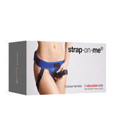 Strap On Me Leatherette Curious Harness Metallic Blue packaging showcasing adjustable belts and design.