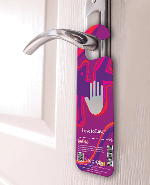 Love to Love Let's Dice with Door Hanger Blue displayed on a door handle, featuring vibrant colors and playful design.