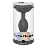 Love to Love Open Roses Silicone Butt Plug Black Onyx Large in transparent packaging showcasing its elegant design.