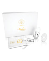 Le Wand Little Pleasures 6 Piece Kit Chrome with box and accessories in elegant white and silver design.