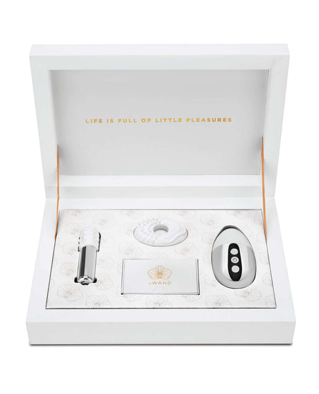 Le Wand Little Pleasures 6 Piece Kit Chrome elegantly displayed in a white keepsake box.