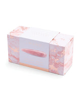 Le Wand Crystal Wand Rose Quartz Dildo elegantly packaged in a marble designed box for sensual self-care.