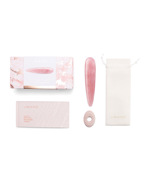 Le Wand Crystal Wand Rose Quartz Dildo with packaging and pouch on a white background.