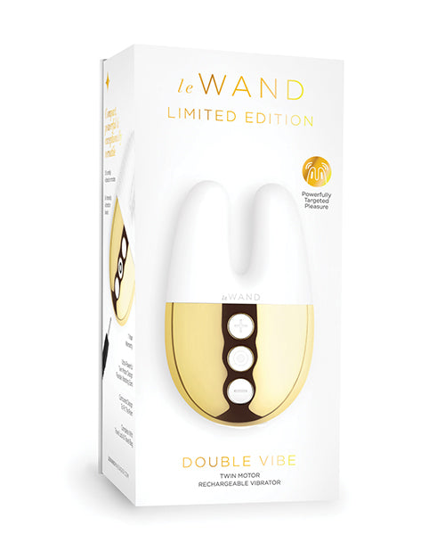 Le Wand Double Vibe Rechargeable Vibrator White Gold packaging showcasing its twin motor and luxurious design.