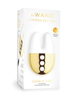 Le Wand Double Vibe Rechargeable Vibrator White Gold packaging showcasing its twin motor and luxurious design.