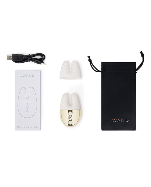 Le Wand Double Vibe Rechargeable Vibrator White Gold with USB cable and storage pouch.
