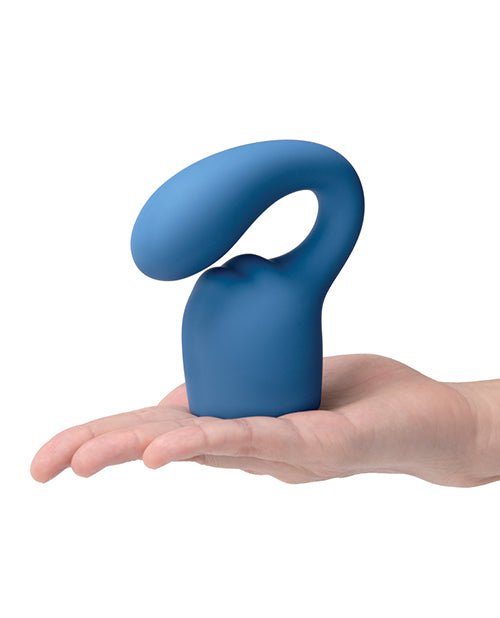 Le Wand Petite Glider Weighted Silicone Attachment Blue in hand, showcasing its ergonomic design and blue silicone finish.