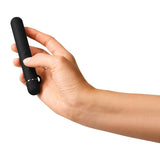 Person holding the Le Wand Chrome Baton Vibrator Black with a sleek design and body-safe material.