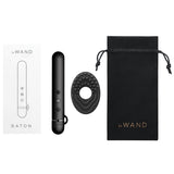 Le Wand Chrome Baton Vibrator Black with packaging and accessories including a textured sleeve and storage pouch.