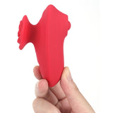 Maia Sola Thumping Massager Red in hand, showcasing its sleek design and vibrant color for intimate luxury.