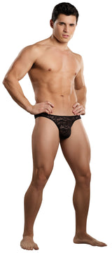 Male Power Bong Thong Stretch Lace Black S M displayed on a model confidently posing in a bold lace design.