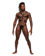 Male Power Sagittarius Leather Harness Black worn by a muscular model showcasing its edgy design and striking accessories.