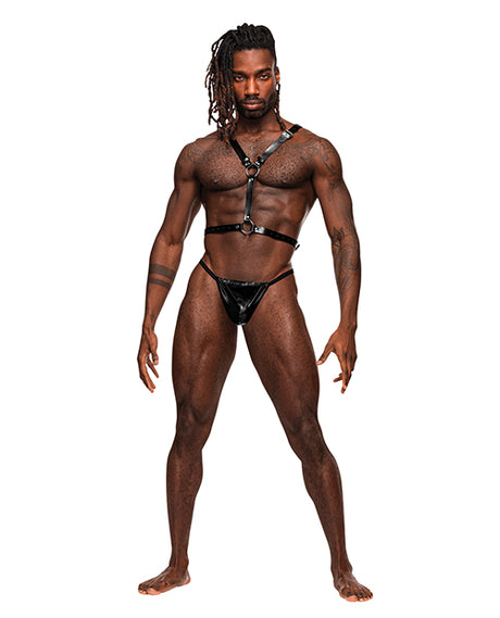 Male Power Sagittarius Leather Harness Black worn by a muscular model showcasing its edgy design and striking accessories.