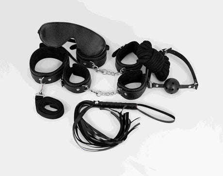 Male Power 7 Pack Lite Bondage Set Fetish Kit featuring restraints, blindfold, and flogger.
