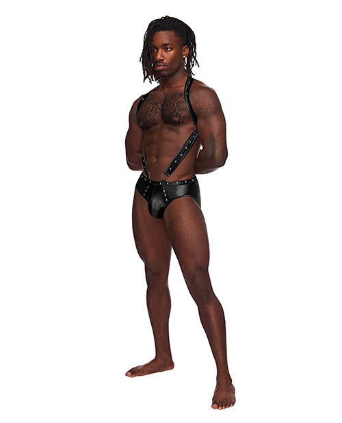 Male Power Uranus Studded Harness Brief Black L/XL worn by a model showcasing the bold faux-leather design.