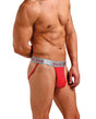 Magic Silk 100% Silk Jock Strap Red Small Medium displayed on a male model, showcasing luxurious comfort and style.