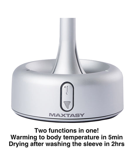 Maxtasy Warming & Drying Dock for Strokers Grey showcasing two functions: warming in 5 minutes and drying the sleeve.