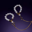 Luxurious pearl anklet with gold accents by UPKO, featuring a unique design for elegant fashion statements.