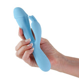 Obsessions Scarlett Light Blue Rabbit Vibrator held in hand, showcasing its soft silicone design for dual stimulation.