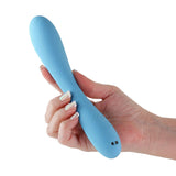 Obsessions Rhett Light Blue Warming G-Spot Vibrator held in hand showcasing its sleek design and functionality.