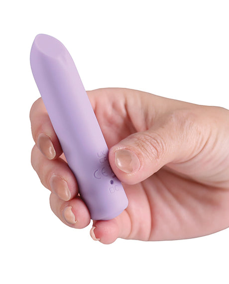 Minnies Dot Flexible Bullet Vibe Lilac held in hand showcasing its compact design and smooth silicone.