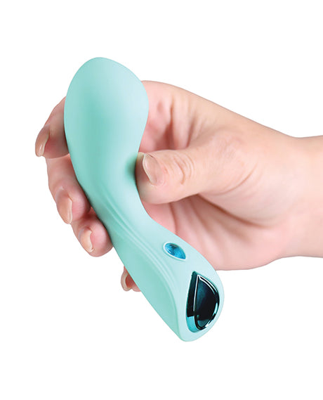 Minnies Wink Flexible Curved Vibe Aqua held in hand, showcasing its sleek design and body-safe silicone material.