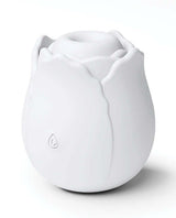INYA The Vibrating Rose Massager Glow in a sleek white design, featuring a petal shape and silicone texture.