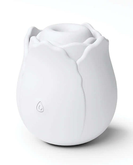 INYA The Vibrating Rose Massager Glow in a sleek white design, featuring a petal shape and silicone texture.