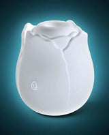 INYA The Vibrating Rose Massager Glow, a sleek white rose-shaped clitoral stimulator by NS Novelties.