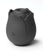 INYA The Vibrating Rose Massager Black, a smooth silicone clitoral stimulator in a petal shape.