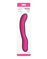 INYA Wiggle Stick Gyrating Silicone Vibrator Pink in packaging showcasing its flexible design and ribbed texture.