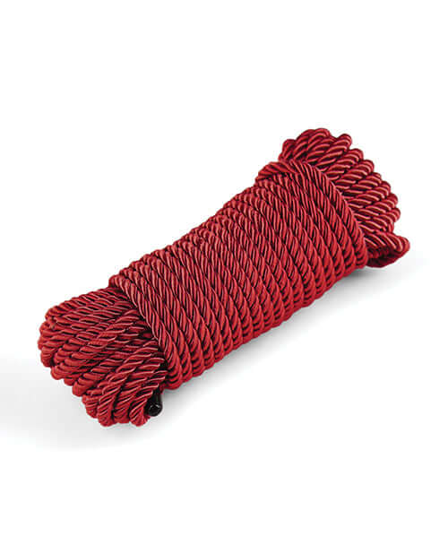 Bound 50 ft Bondage Rope Red coiled for secure and comfortable bondage play.