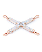 Cosmo Bondage Hogtie Rainbow Vinyl Restraint featuring a holographic design and easy-to-use clips for BDSM play.
