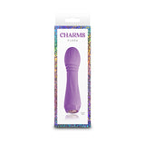Charms Flora Rechargeable Silicone Mini Vibrator Violet with LED heart in packaging, compact pleasure toy design.