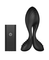 Nexus Bendz Remote Control Butt Plug Medium Black next to its remote control for easy operation.
