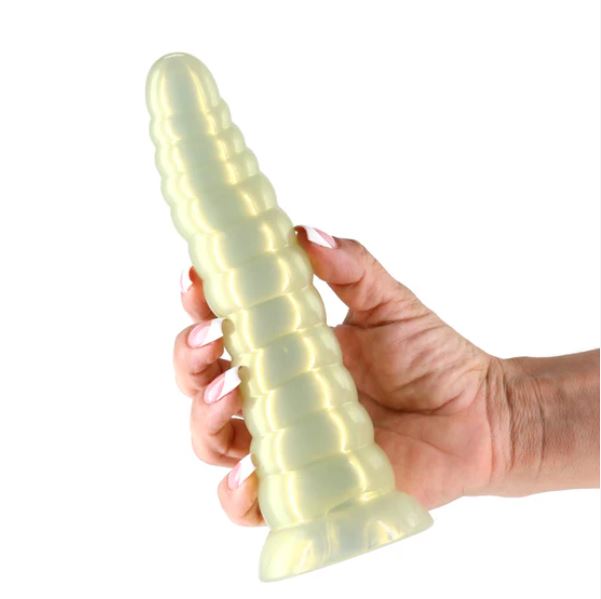 Fantasia Nymph 7.4 Inch Flexible Dildo Amber held in hand, featuring a smooth, shimmering finish.