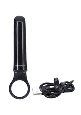 Black silicone toy with USB charging cable and loop handle.